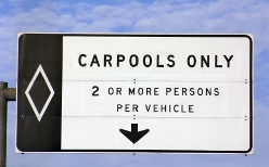 Photograph of a carpool freeway sign